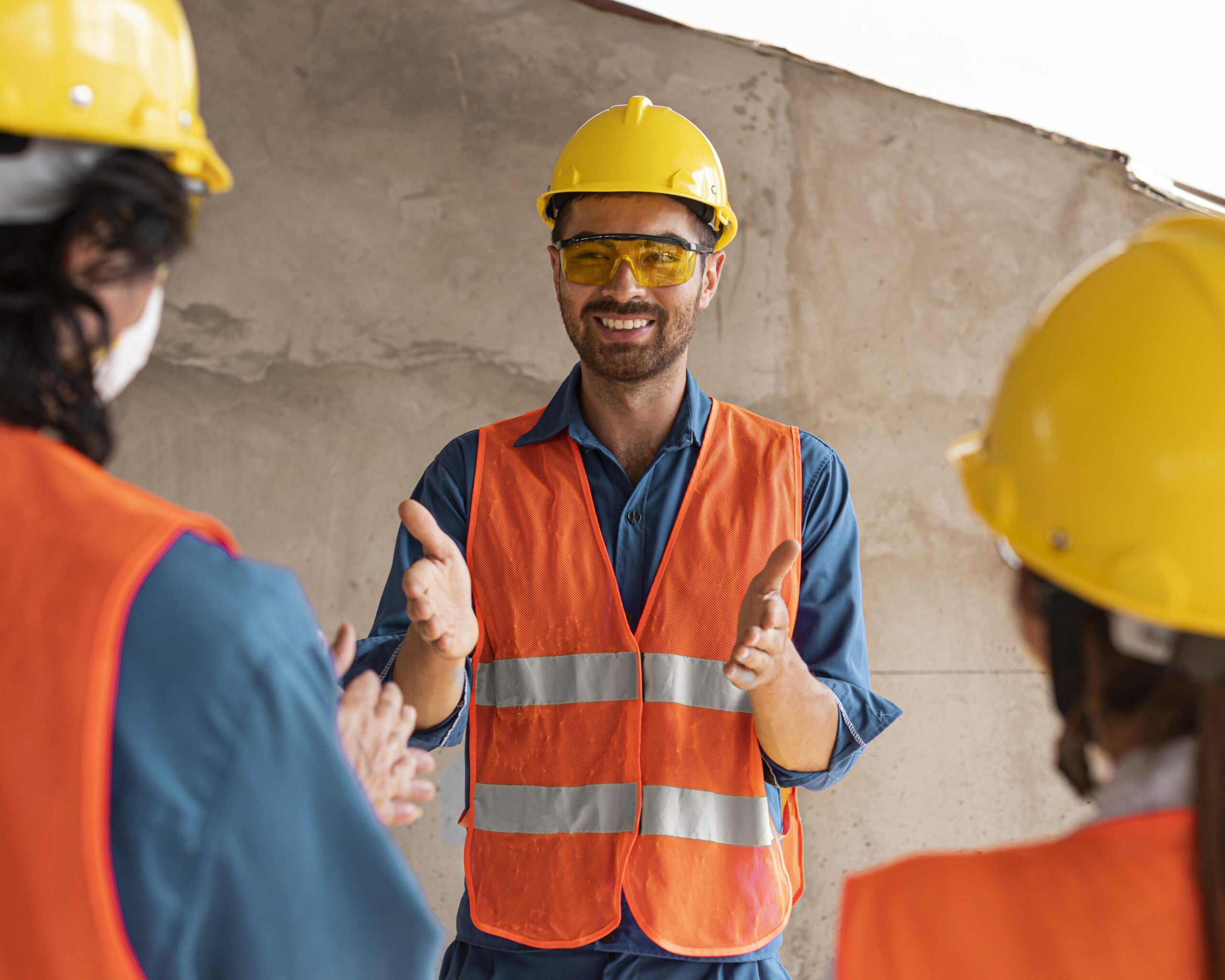 colleagues with safety equipment